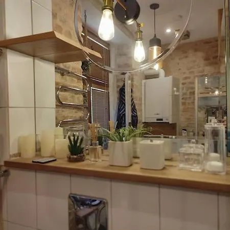 уютный лофт среди старых парков Apartment